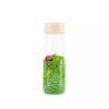 Petit Boum sensory sound bottle with green rice and a ladybird figure inside.