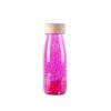 Petit Boum Sensory Bottle. Sensory float bottle in pink colour with glitters inside.