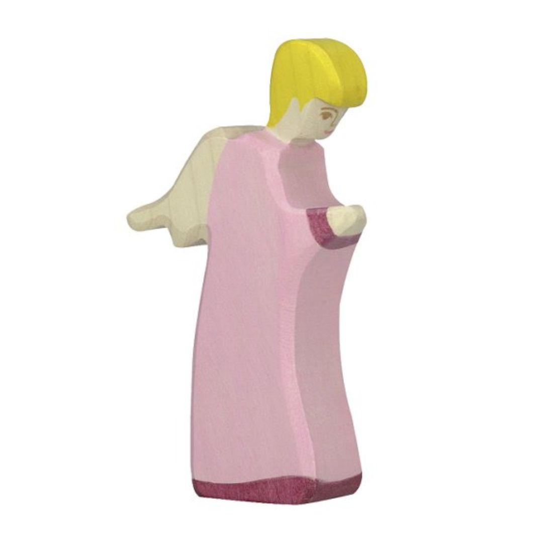 Handcrafted Holztiger archangel figure with wings and rose dress for nativity scene.