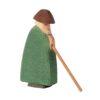 Ostheimer old shepherd figure wearinga green coat, holding a staff and head down.