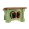 A small Ostheimer wooden house made of green walls and brown roof, suitable to be used together with the Ostheimer rabbits and geese as a hutch.